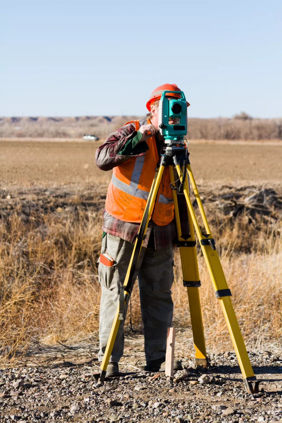 land-surveyors-measuring-existing-railroad-bridge-rural-area