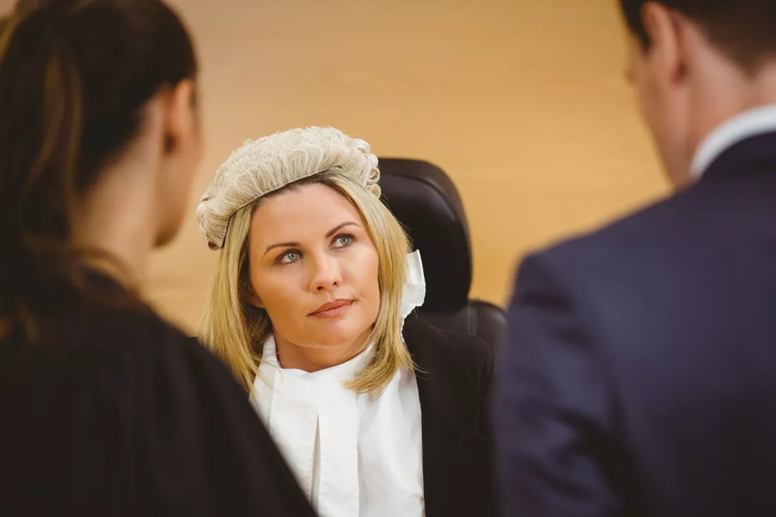 judge-lawyer-listening-criminal-handcuffs